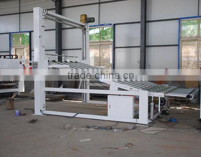 Automatic corrugated paperboard stacking machine