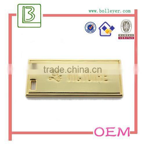 metal oval shaped logo patch