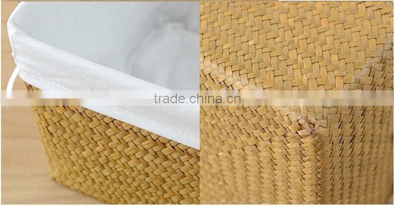 basket made of natural straw seagrass for housewaring with handle and lining