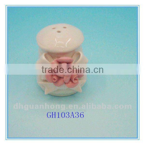 Mini white ceramic pepper caster