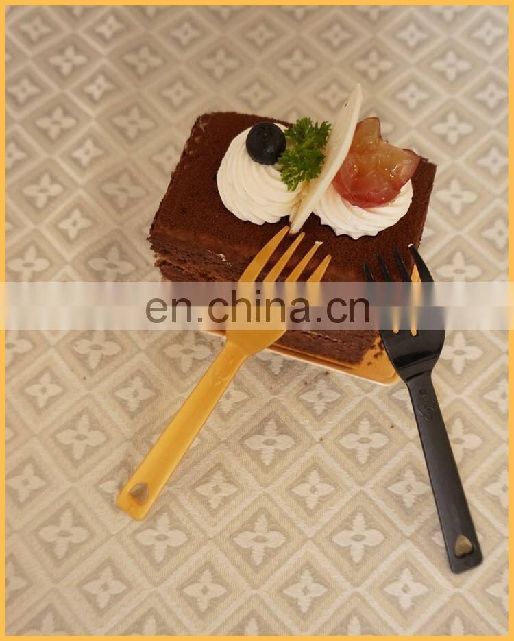 Disposable plastic spoon and fork