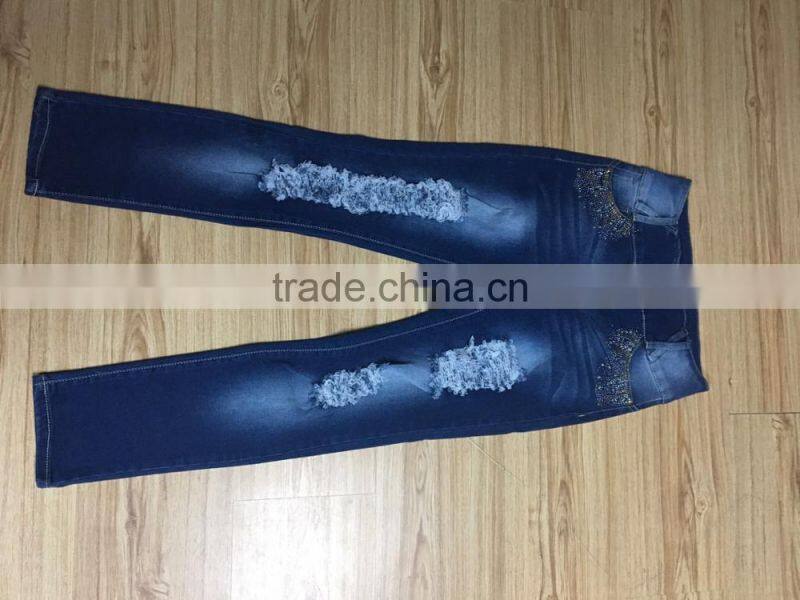 GZY slim and ripped hole women jeans leather label stock high quality wholesale china 2017