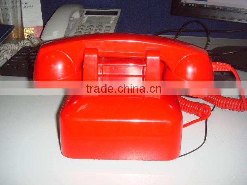 cute vintage landline telephone set with clock and display