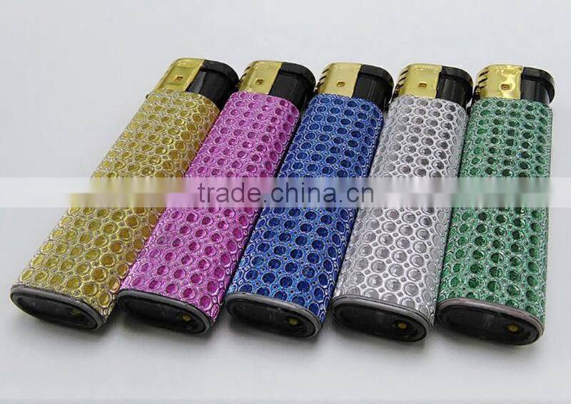 Silver match lighters colored with golden cap star lighter