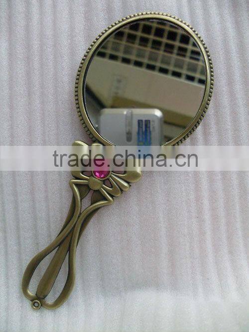 Antique bronze hand makeup mirror with comb in one set