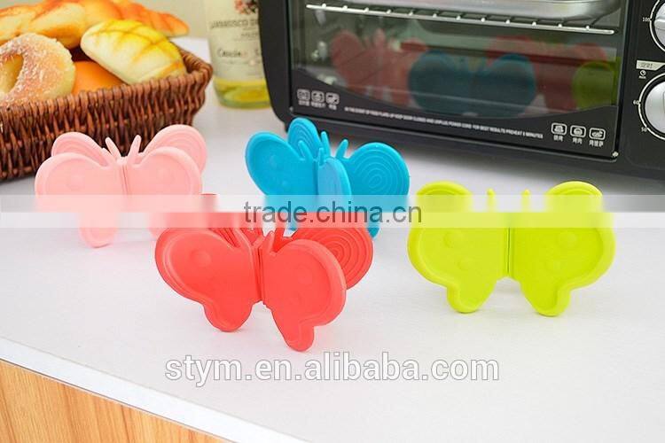 Kitchen butterfly heat insulated/resistant dish holder