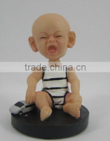 cute boy sitting small resin figurine