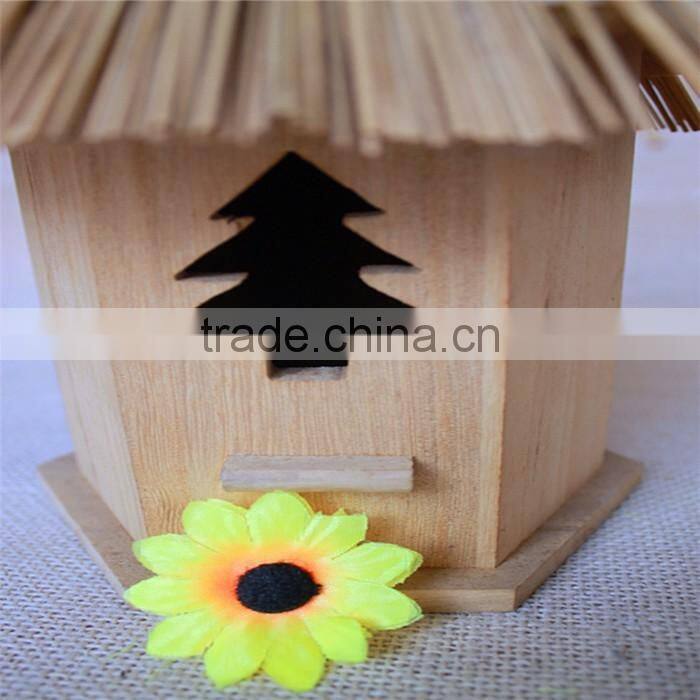 Wood carved bird christmas miniature houses with tree shaped window