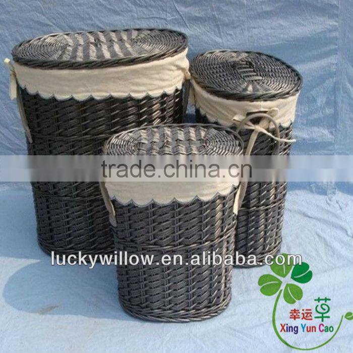 large round wicker laundry basket with lid