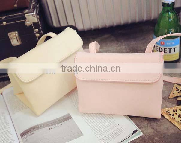 Newest fashion triangle girls pu sling bag