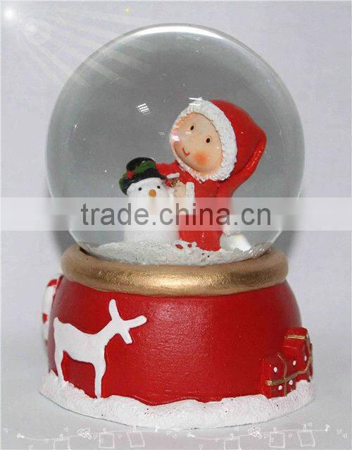 Resin santa snow globe with blowing snow
