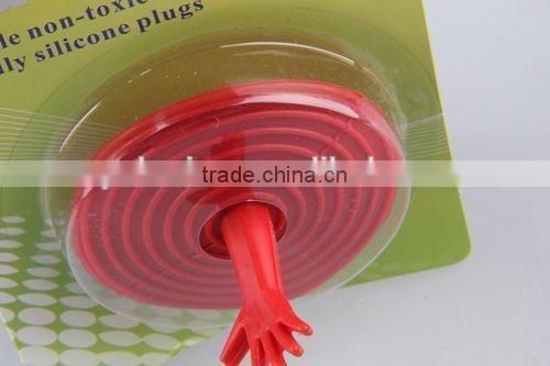 Hand shaped spiral circular silicone sink stopper