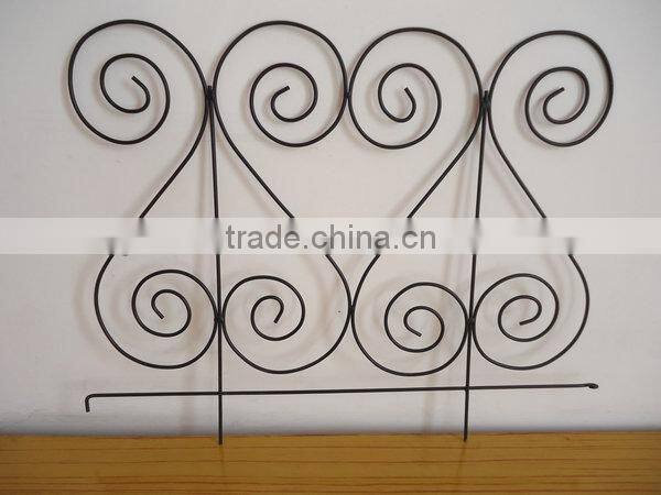 scrolled garden fence