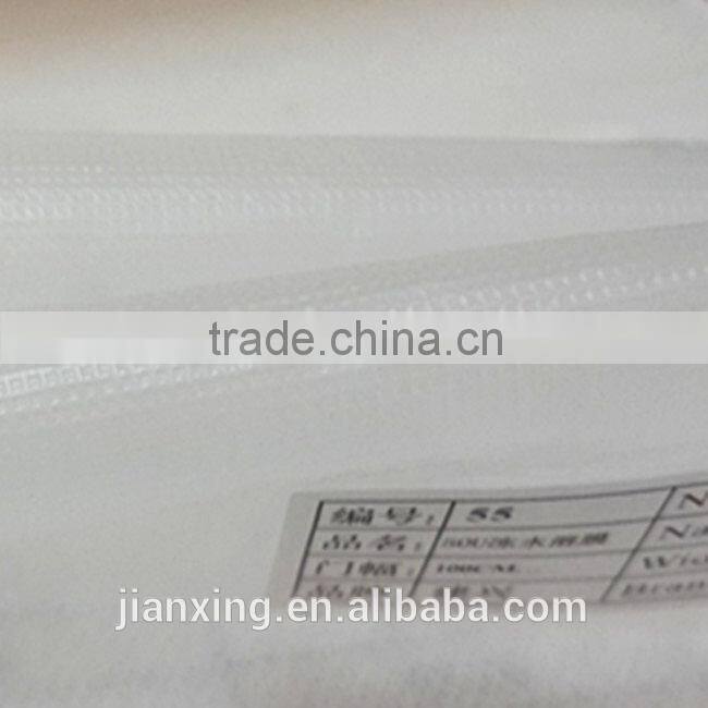 Hot and cold water soluble adhesive interlining for garment embroidery