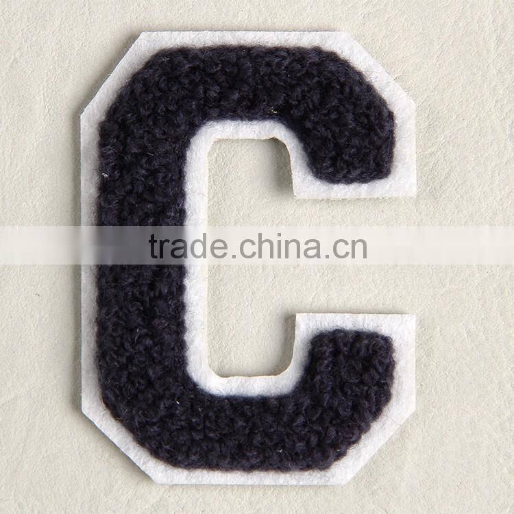 Knitting woolen yarn embroidery label made from China label factory for broadloom carpet and bedding sets