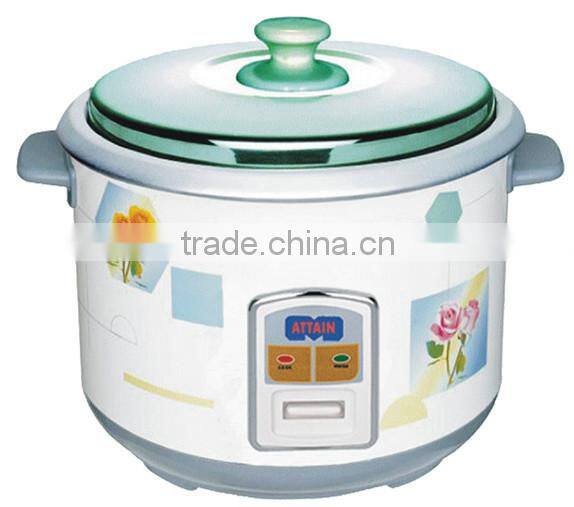 rice cooker with spoon and measuring cup