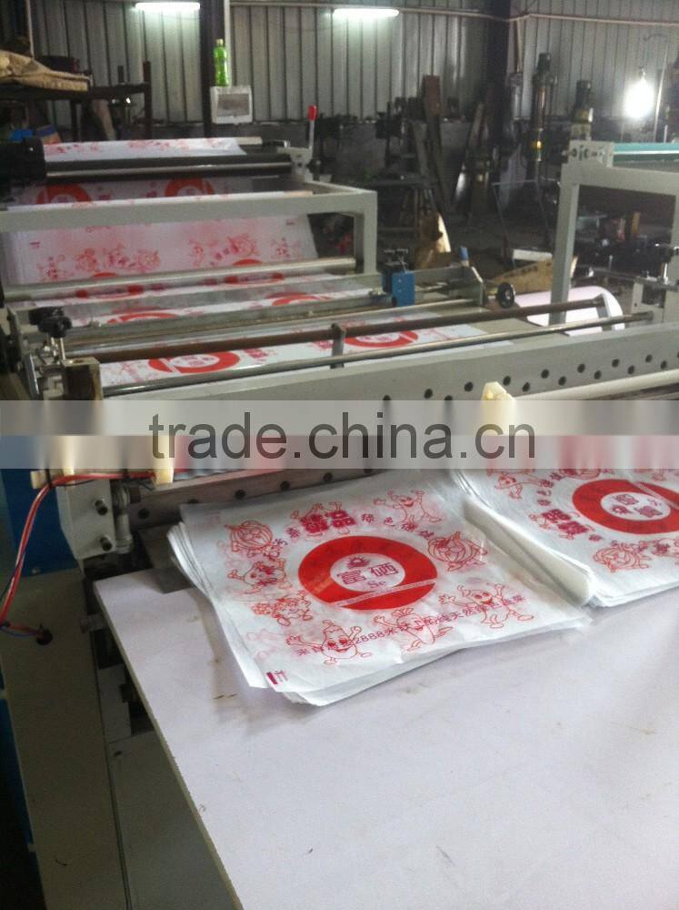 Economic type cake or bread oil on paper roll cutting machine