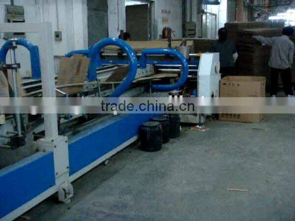 Stitching Machine With Automatic Strapping Machine