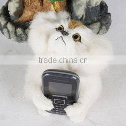 Furry toy looking up lifelike fake animal gorilla