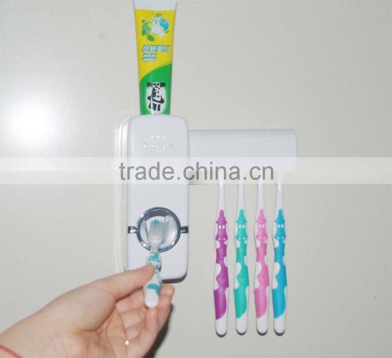 Wholesale children automatic toothpast dispenser toothbrush that dispenses with brush holder bathroom set
