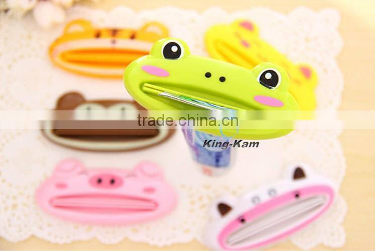 hot selling plastic toothpaste tube squeezer/toothpaste dispenser,wholesale custom children automatic toothpaste dispenser