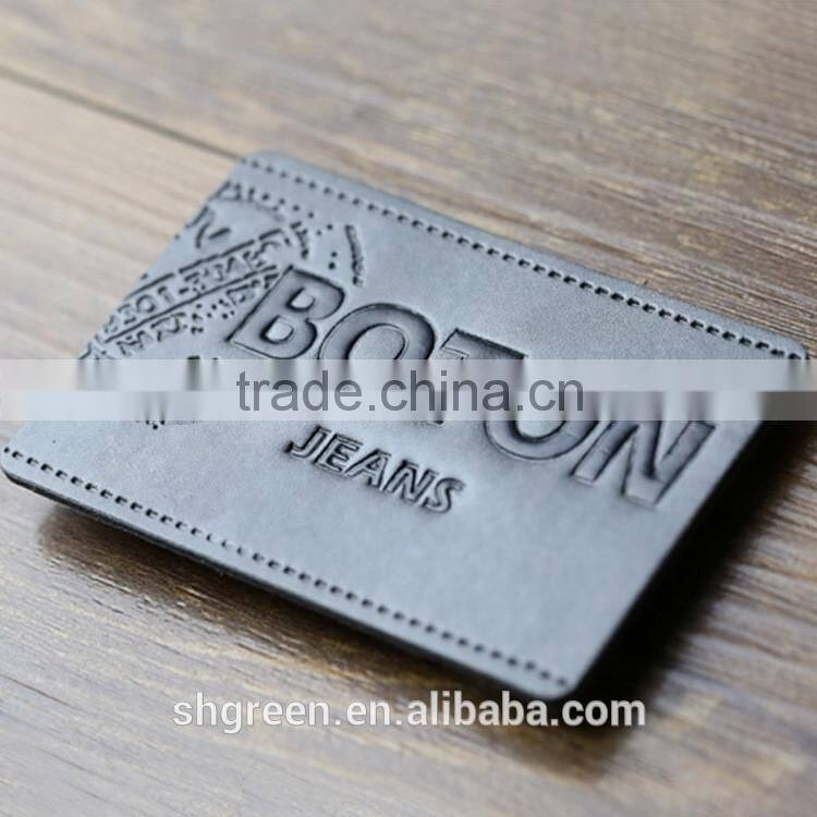 Fashion jeans brand name faux leather patch