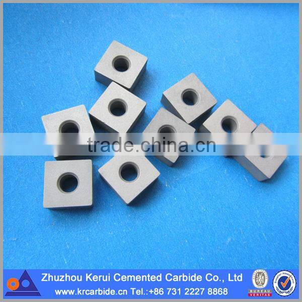 Cemented tungsten carbide cutter and insert for stone cutting in chain saw machine