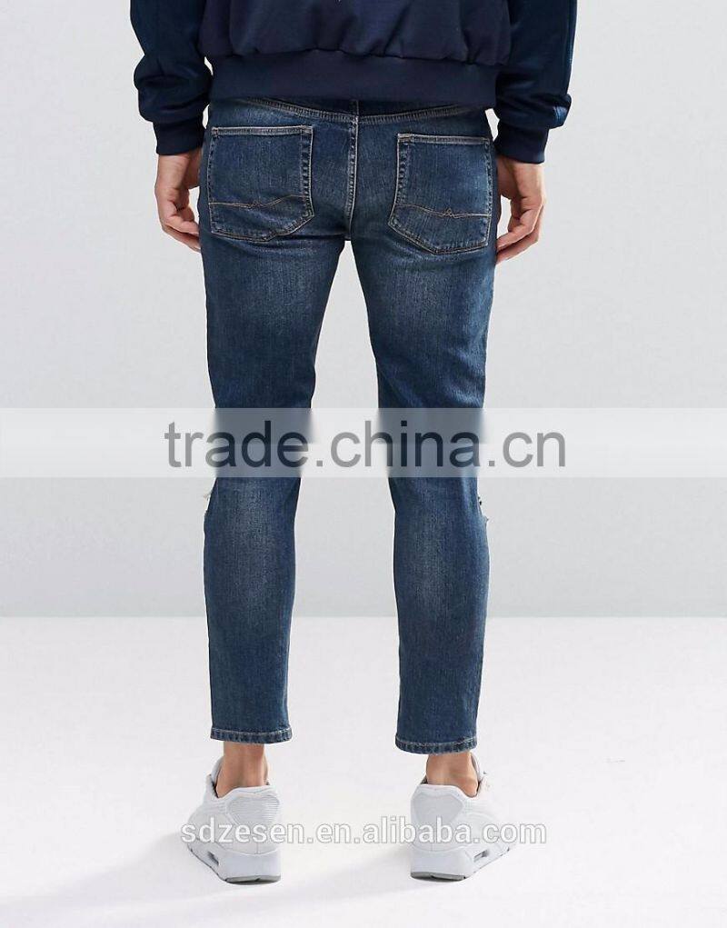 Men Custom Apparel Skinny Cropped Jeans Ripped Denim Pants With Extreme Rips In Blue Wash