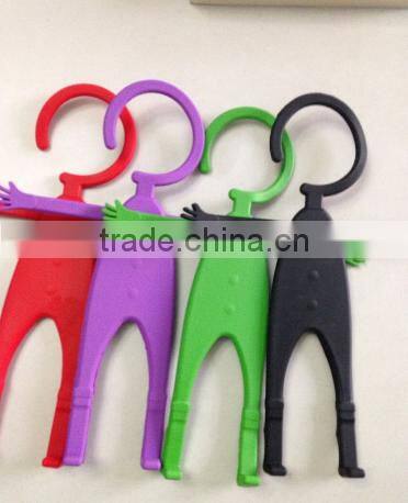 Phone Partner = flexible cell phone holder human hanger design