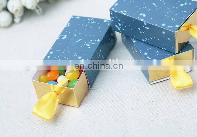 Just arrival constellation slide favor box with gold ribbon
