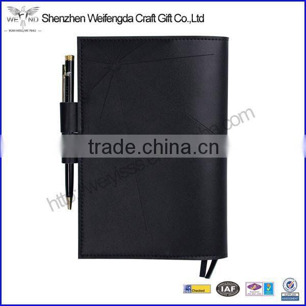 Black fashionable a5 refillable genuine leather notebook with pen attached