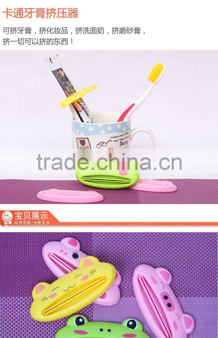 lovely cartoon toothpaste squeezer Dispenser Rolling Holder tools