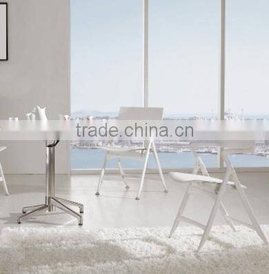 White outdoor plastic folding chair for wedding/garden