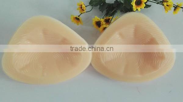 triangle shape hot selling fake sexy silicone breast falsies for male cross dressing or female breast enhancements or prosthesis
