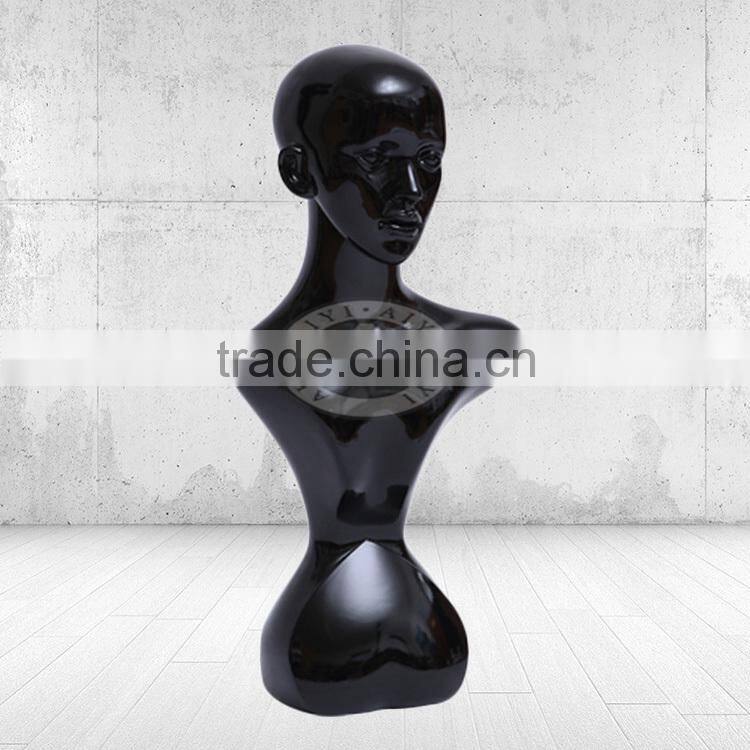 White glossy female mannequin bust without head
