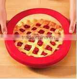 Silicone pie crust shield , pie protector