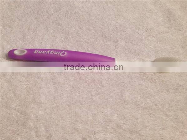 Personalized purple plastic toothbrush with rubber handle for adult