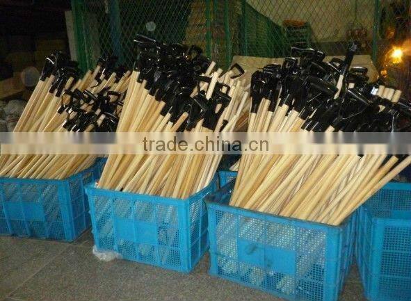 Plastic snow shovel with wood handle