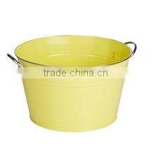 yellow metal tub with handles