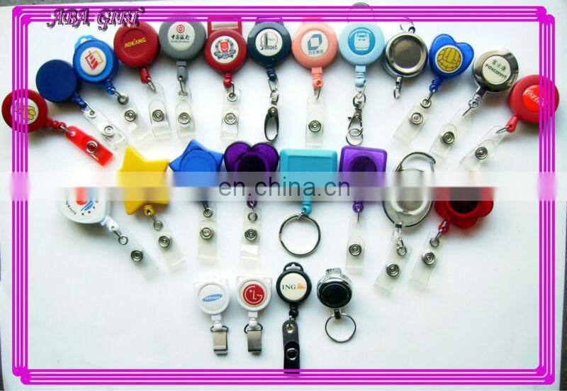 Plastic badge reel retractor