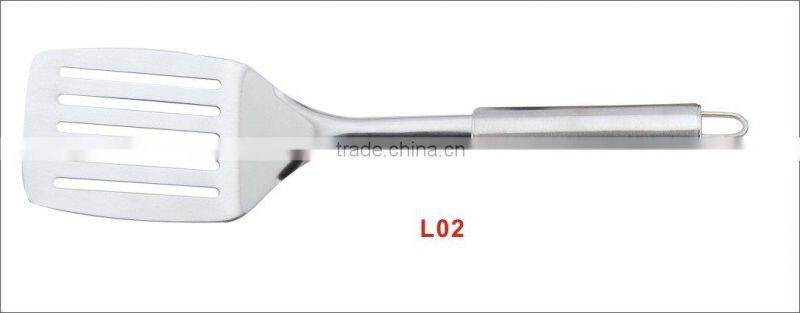 Cooking tool slotted turner