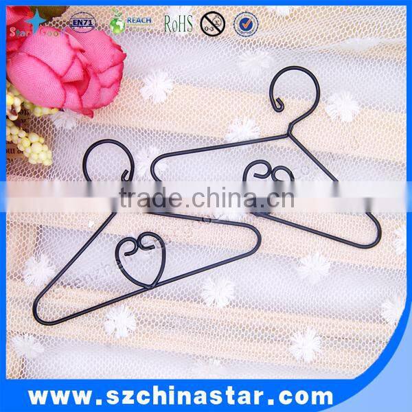 Small hangers for doll clothes