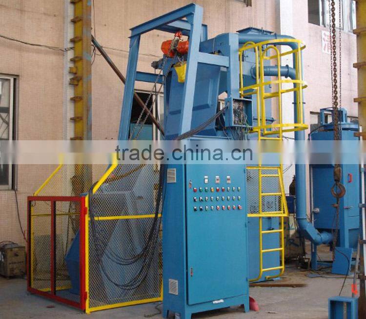 Q32 Tumble rubber/steel belt barrel shot blasting equipment China