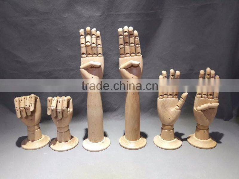25cm height female left wooden hand beech wood with round wooden base an articulated hand