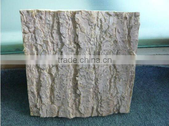 Artificial tree tower with artificial tree bark