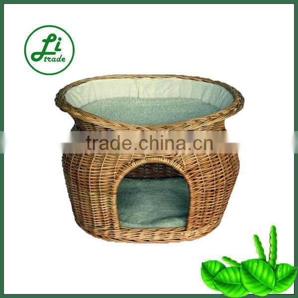 lovely double decker wicker dog house