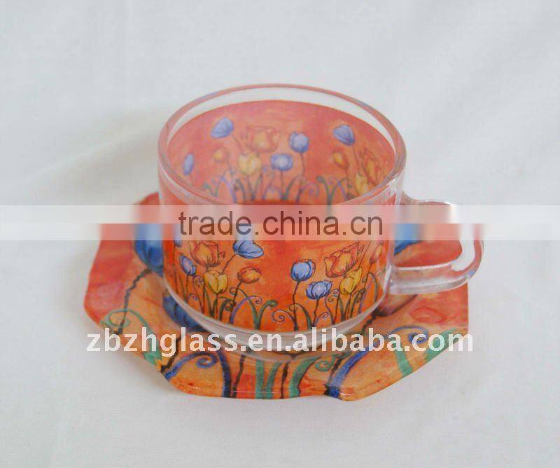 glass coffee cup and glass plate
