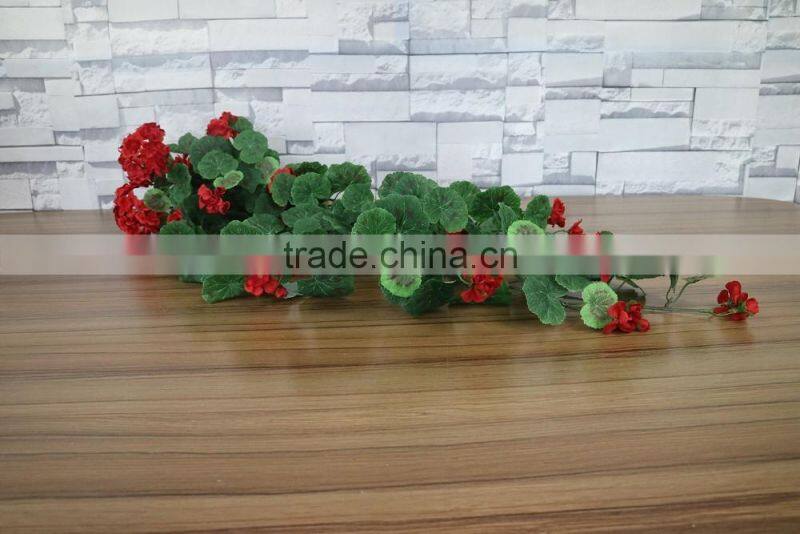 Artificial begonia flowers hanging