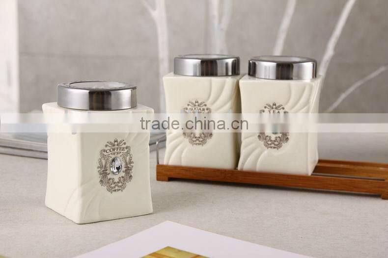 ceramic canister set with stainless lid & wooden stand