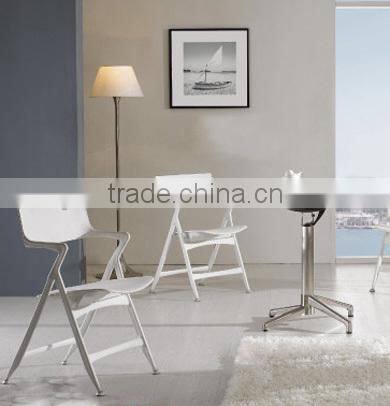 White outdoor plastic folding chair for wedding/garden